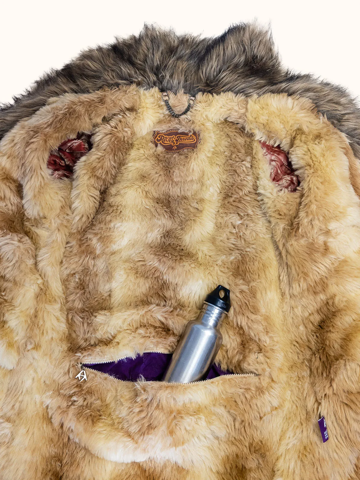 Fela Ultimate Festival Coat internal view with water bottle pocket – premium festival coat by Revel Threads