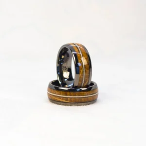 Barrel Groove Ring bright studio front view, tungsten carbide, whiskey barrel wood, guitar string inlay