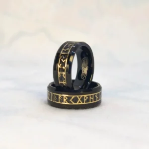 Odin’s Forge Ring standard front view, black tungsten base, viking rune detail, carbon fiber backing