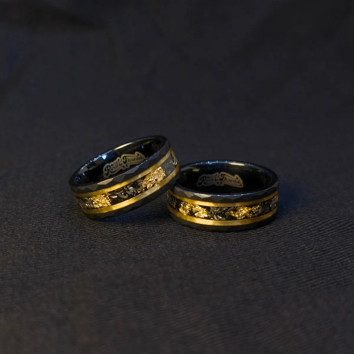 Stellar Drift Ring dark cosmic background, tungsten carbide, meteorite and gold leaf inlay, polished black edge