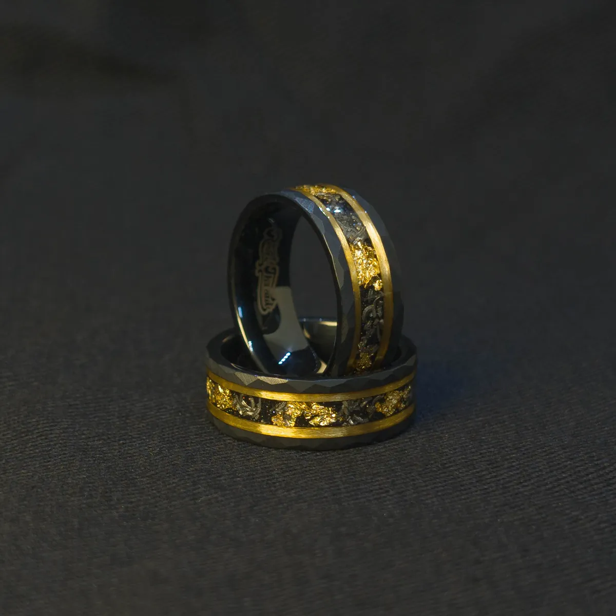 Stellar Drift Ring dark cosmic background, tungsten carbide, meteorite and gold leaf inlay, polished black edge