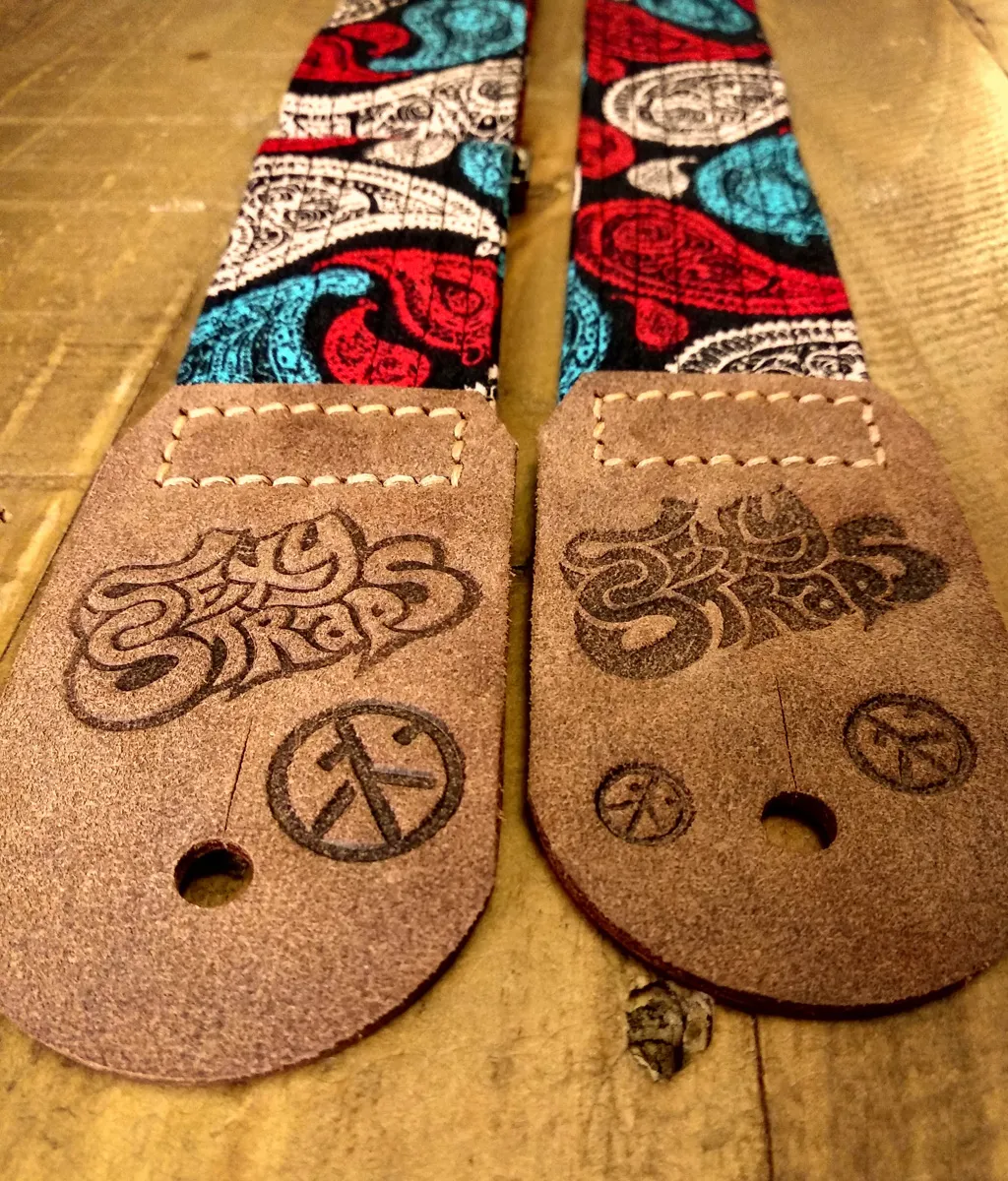 Three P Sweet guitar strap, handmade, real leather ends, blue, beige and red paisley on black background colours - Sexy Straps by Revel Threads